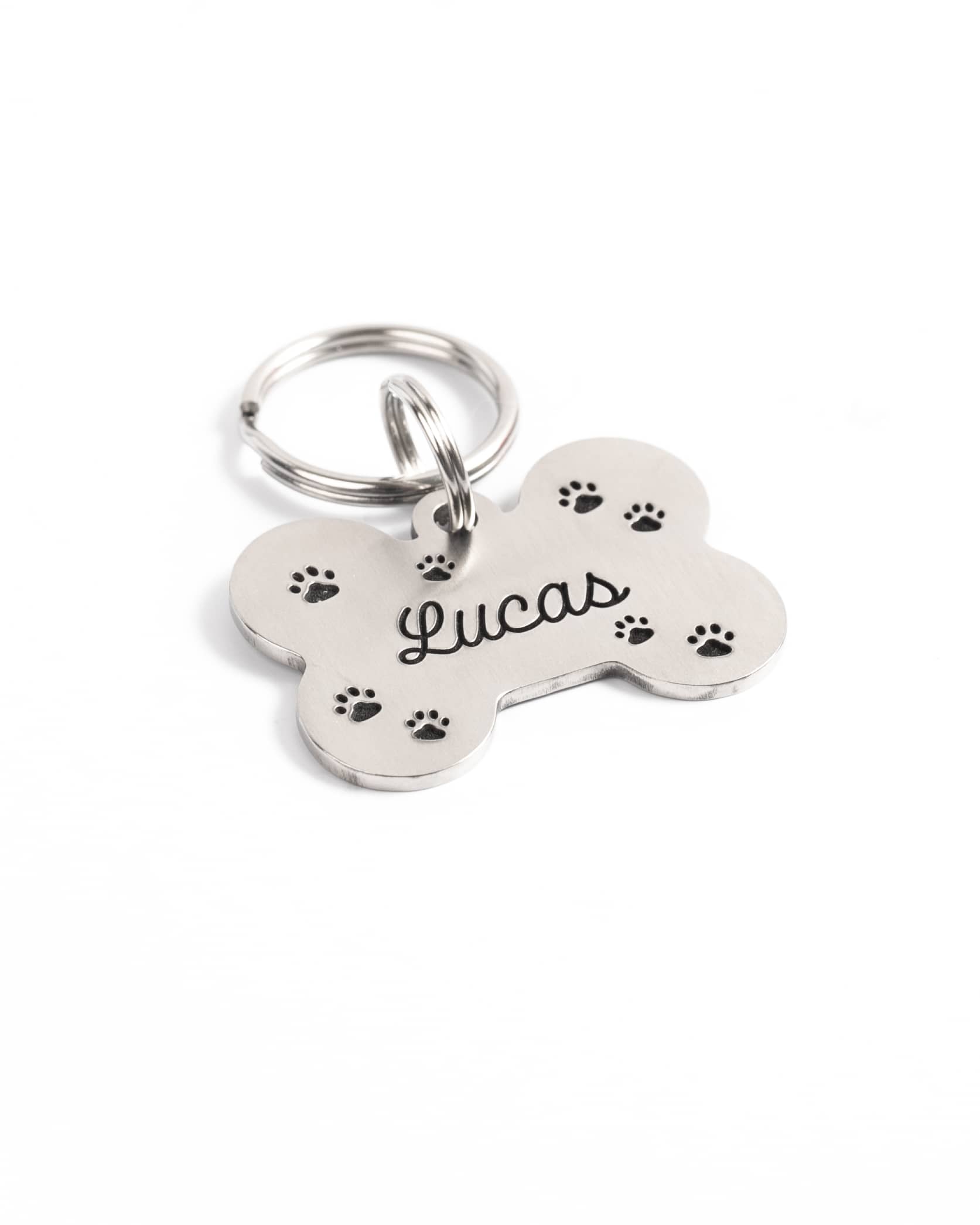 Placa o medalla para identificar a tu mascota, perro o gato. Elaborado con metal grueso resistente y grabado a laser. Envío a toda Guatemala.